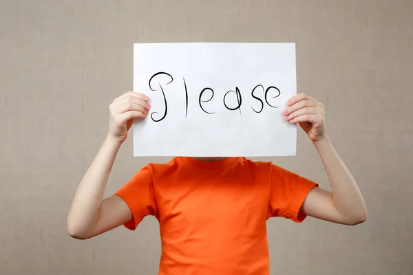 Tenåringsjente Holder Skjorte Stykke Papir Med Ordet Please Foran Henne – stockfoto