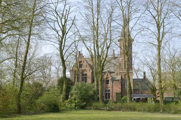 Brick building in Brugge park — Stock Photo, Image