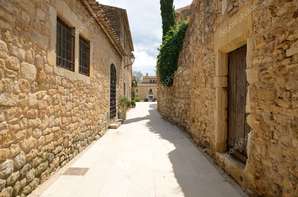 Stone alley  in the medieval village of Peratallada, located in the middle of the Emporda region of Girona, Catalonia, Spain.