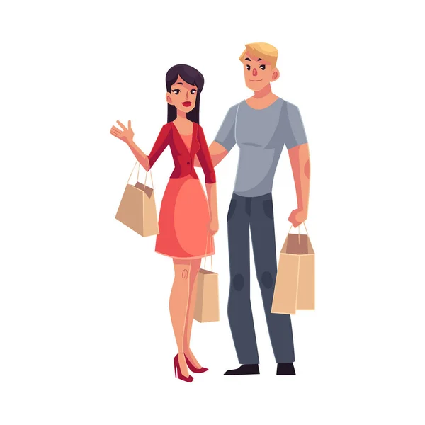 Couple of young man and woman with shopping bags — Stock Vector