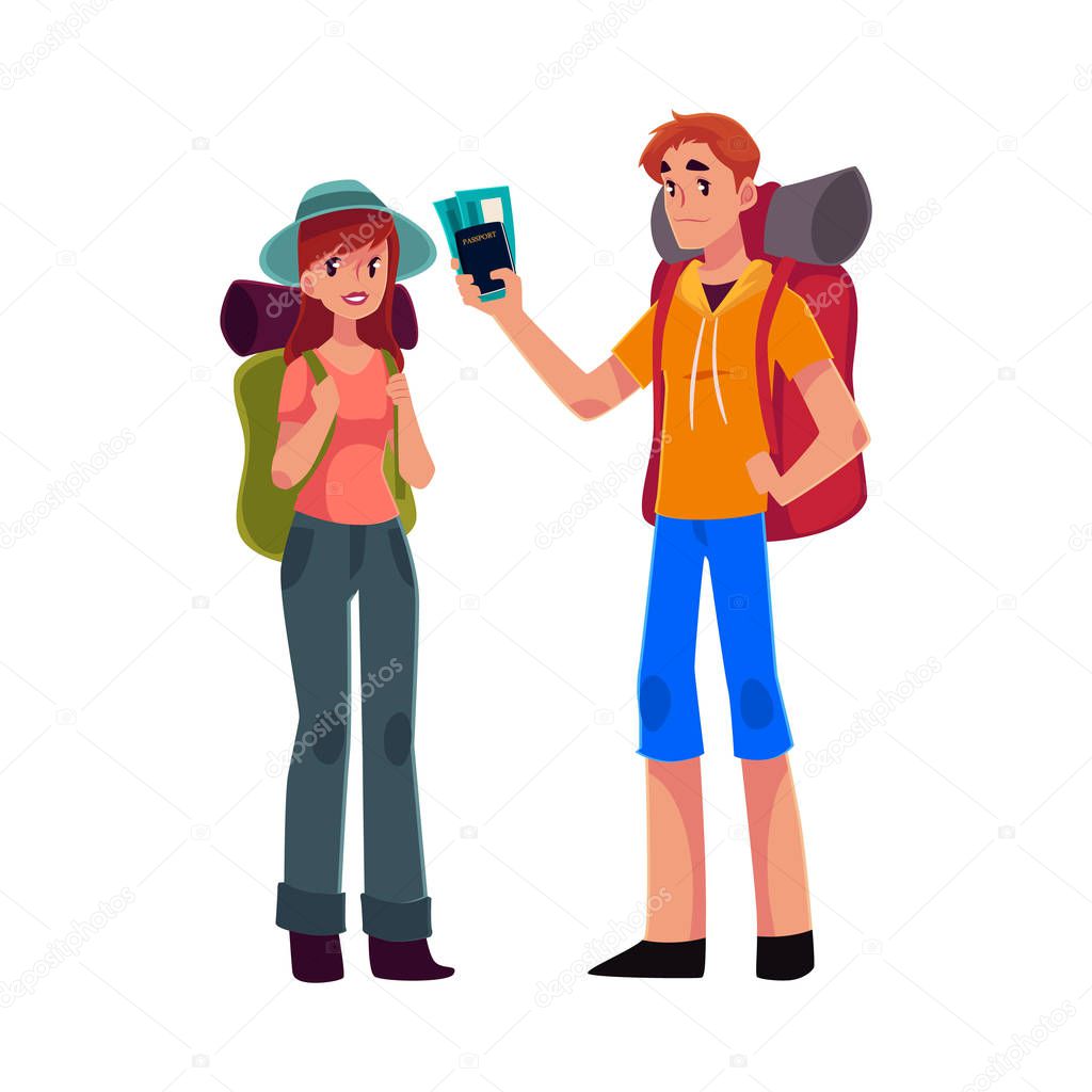 Young backpackers with backpacks, sleeping bags and camera, travelling together