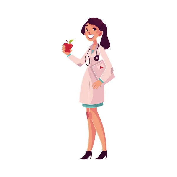 Felice, sorridente dietista femminile che tiene bilance ponderali e mela — Vettoriale Stock