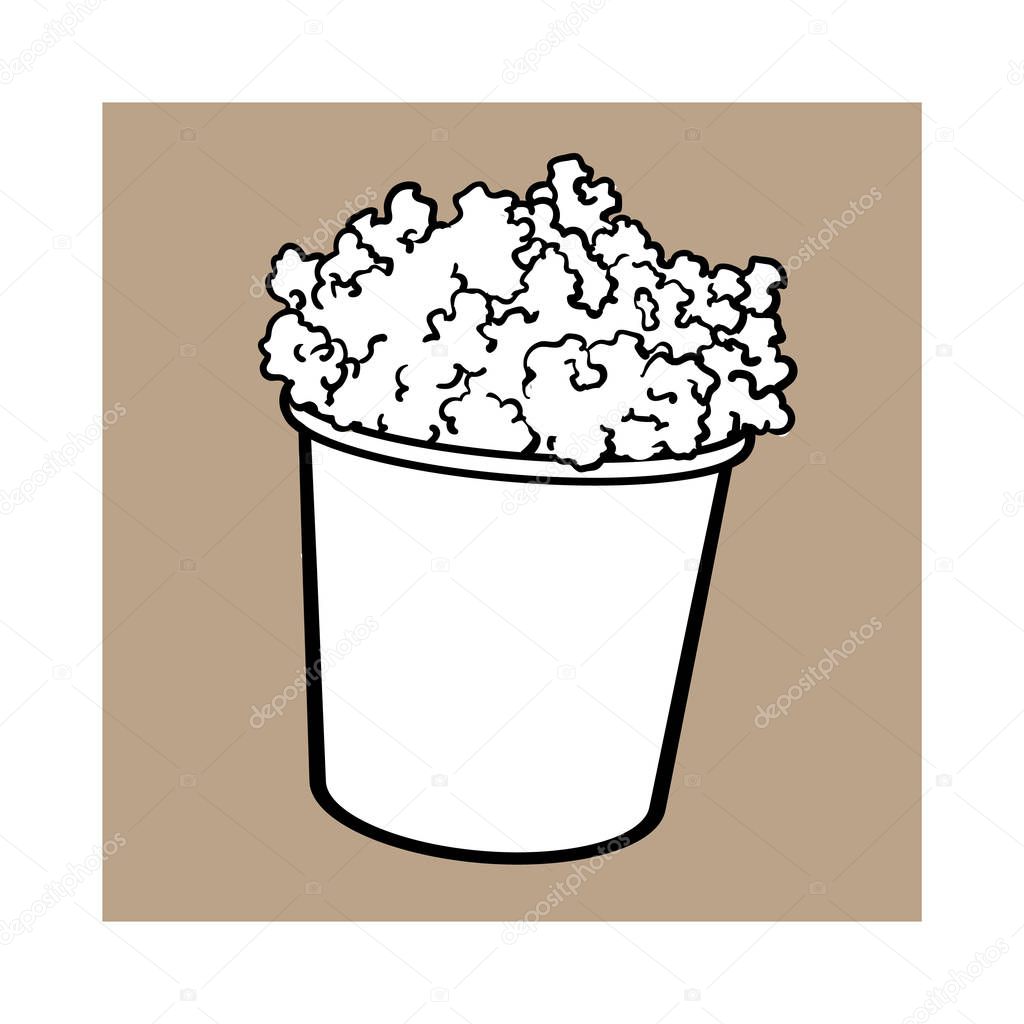 Cinema popcorn in a big black and white striped bucket