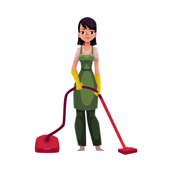 Layanan gadis pembersih, charwoman di overall berdiri dengan vacuum cleaner - Stok Vektor
