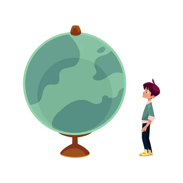 Vector boy with schoolbag looks at big globe — Stock Vector