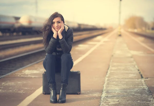 Cute woman at the train station — Stock Photo, Image