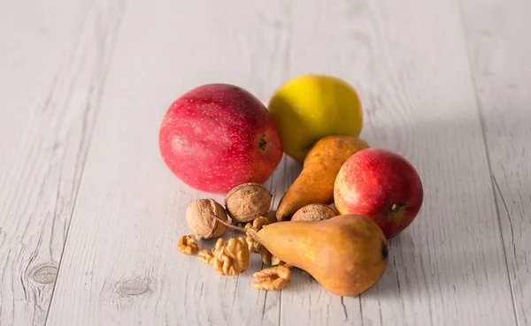 Fruits on a wooden background — Stock Photo, Image