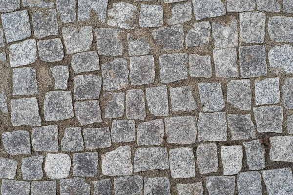 Antiguo camino pavimentado con piedras de granito — Foto de Stock