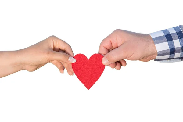 Red heart shape in woman and man hands isolated on white — Stock Photo, Image