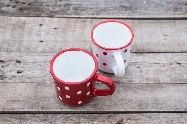 Two Empty Polka Dot Mug Wooden Table — Stock Photo, Image