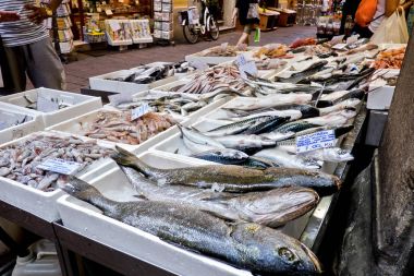  Fish stand at the open street market in the historic center of bologna clipart