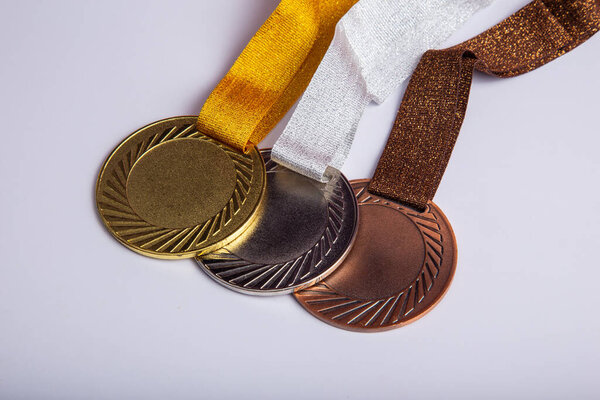 Gold medal, silver medal and bronze medal concept for winning or success