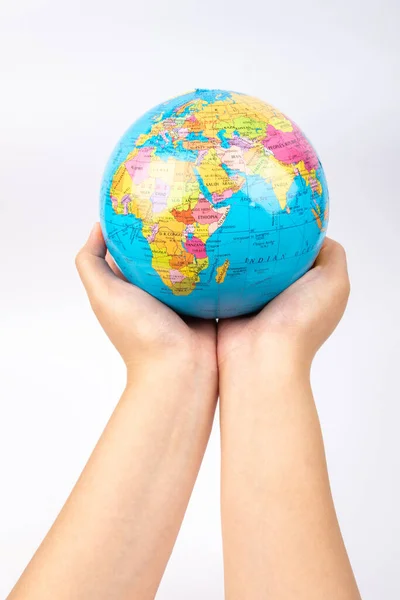 Lady hand hold earth globe on white background