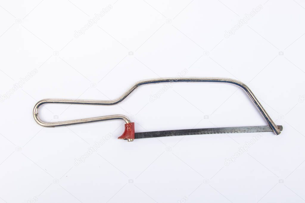 Man hand with Junior Hacksaw on a white background