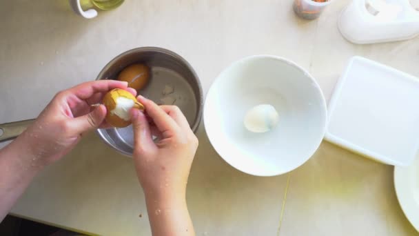 Woman Peeling Hard Boiled Egg — Stock Video