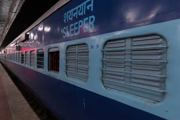 Sleeper class coach, cheap way to commute by night train in India.