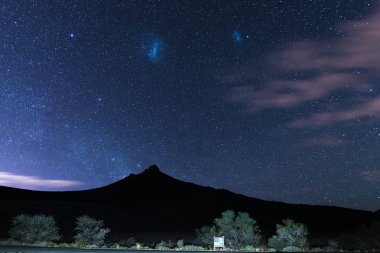 The starry sky and magellanic clouds captured Karoo National Park, South Africa, in winter. clipart