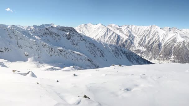 Panorama on snow capped mountain peaks and ridges of the majestic italian alpine arc in winter season and Christmas time. — Stock Video