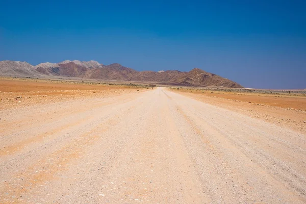 Road trip in the Namib desert, Namib Naukluft National Park, travel destination in Namibia. Travel adventures in Africa. — Stock Photo, Image