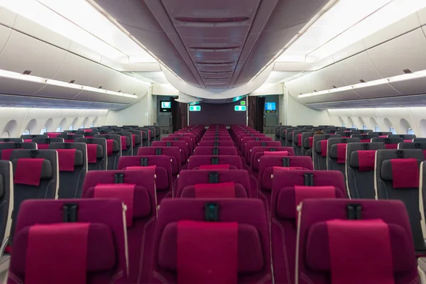 Empty aircraft cabin interior due to covid-19 medical global emergency pandemy. Transportation lockdown airline company economy default. No passenger on commercial plane.