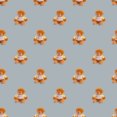 Gri arka planda oyuncak kahverengi ayılar ile kusursuz desen.