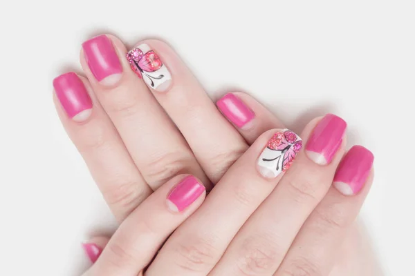 Multi-gekleurde gelei snoep in de handen met een heldere nail polish — Stockfoto