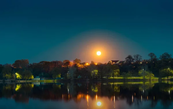 Moon rising over lake night lake rive