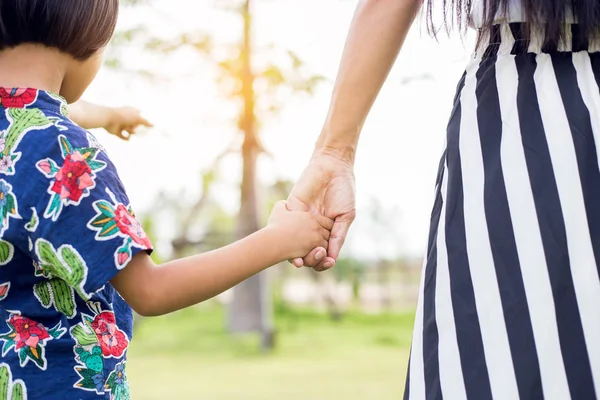 Mother's and a child hands