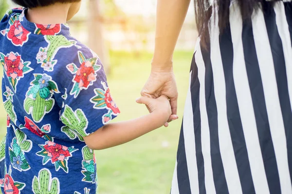 Mother's and a child hands