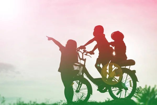 silhouette of a happy children and happy time sunset