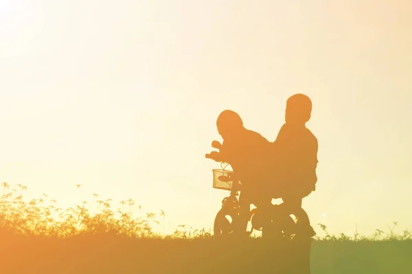 Two Little Boys Bike Silhouette — Stock Photo, Image