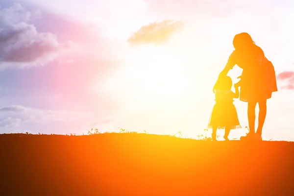 Mother Holding Baby Walking Sunset Background — Stock Photo, Image