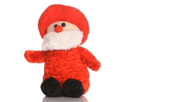 Doll Santa Claus singing Christmas song on a white background. — Stock Video