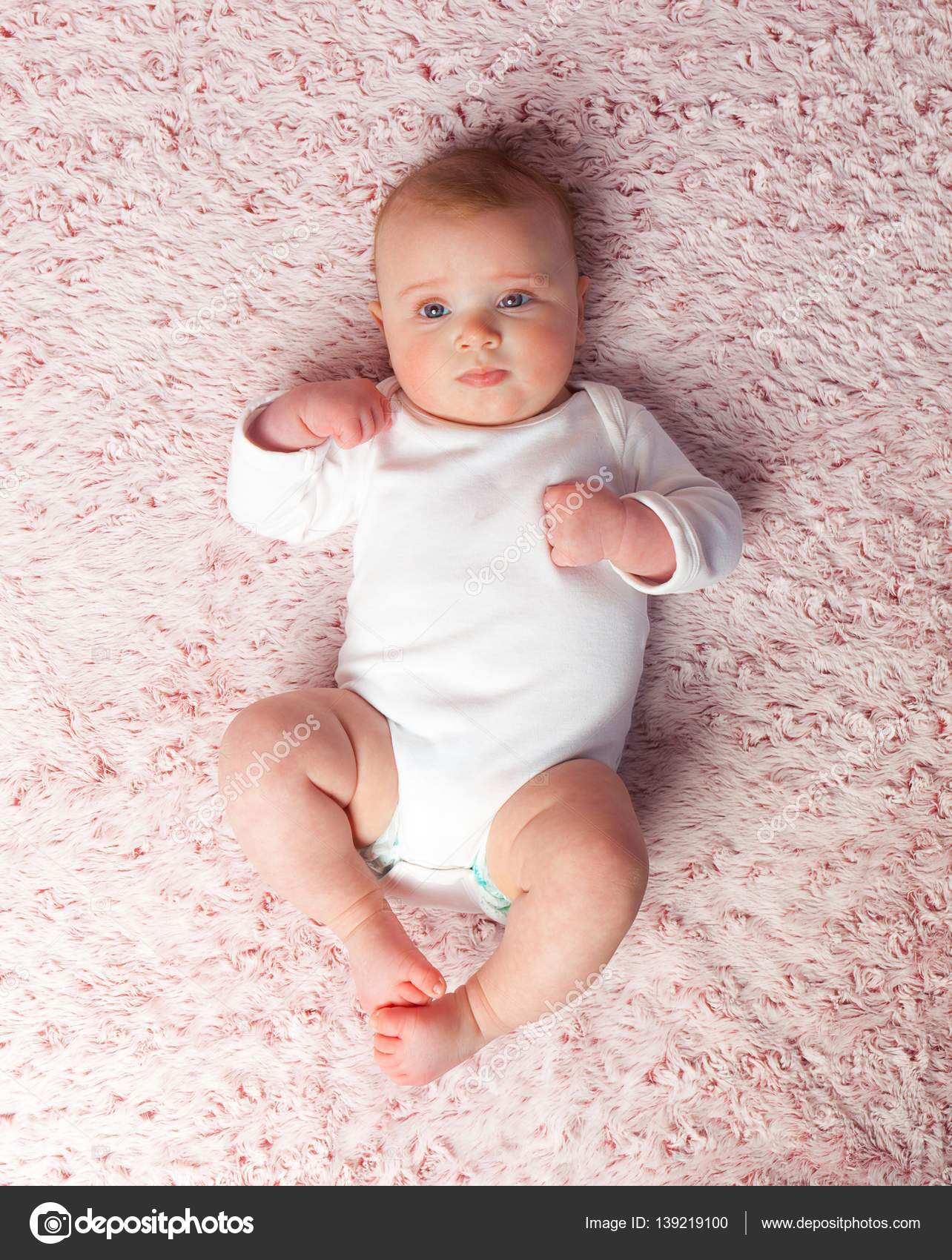 Laying Newborn Baby Girl With White Bodysuit Stock Photo By C Antoniogravante
