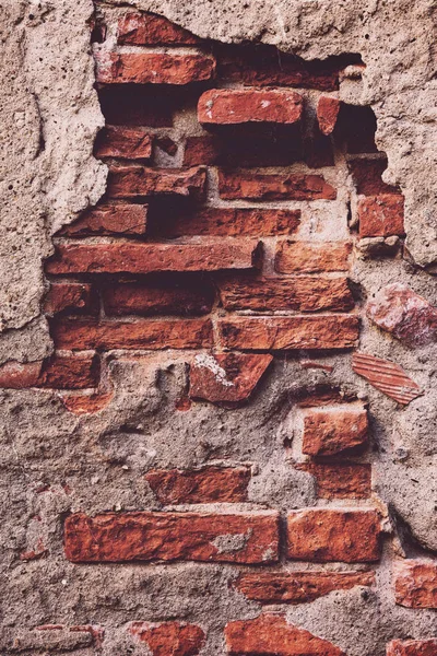 Alçı grunge arka plan peeling ile eski tuğla duvar