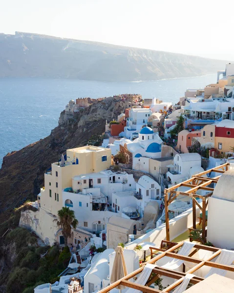 Sunset scene in the town of Oia. — Stock Photo, Image