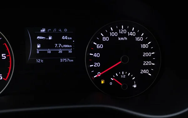 Fuel consumption theme. Empty tank indicator on car dashboard