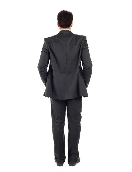 Rückansicht des ganzen Körpers eines Geschäftsmannes im schwarzen Anzug. — Stockfoto