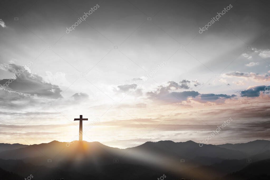 Christmas concept: Crucifixion Of Jesus Christ Cross At Sunset