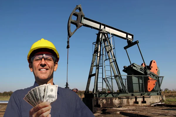 High Paying Jobs Concept Oil Worker Petroleum Engineer Holding Dollar — Stock Photo, Image