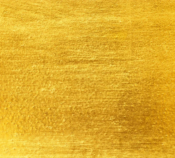 Brillante foglia giallo oro lamina texture — Foto Stock