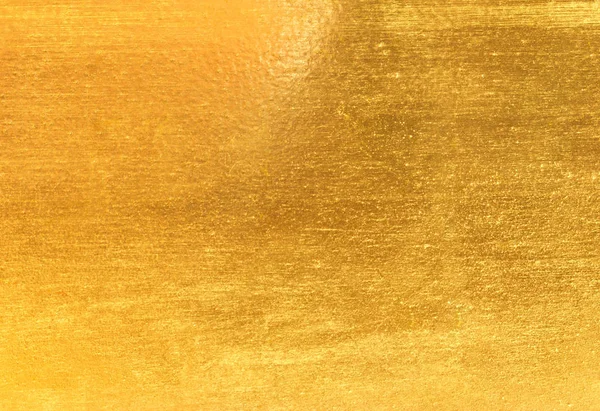Glanzend geel blad goud folie textuur — Stockfoto