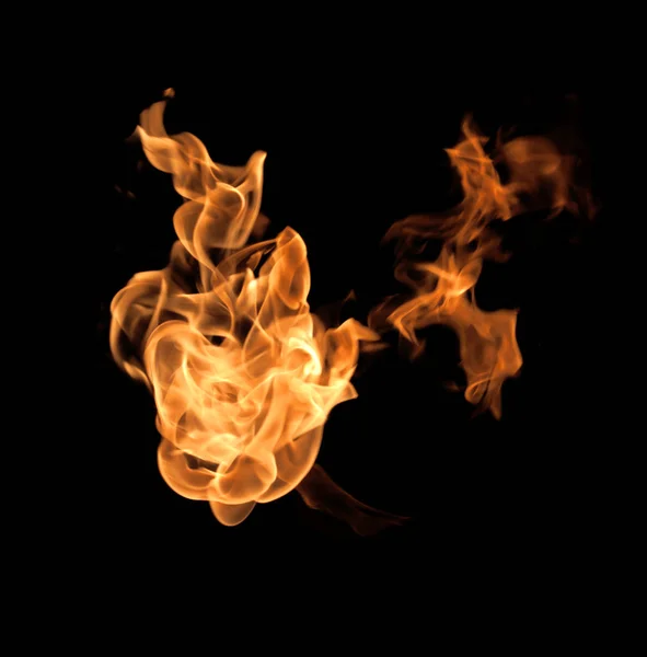 Fire flames on a black background — Stock Photo, Image