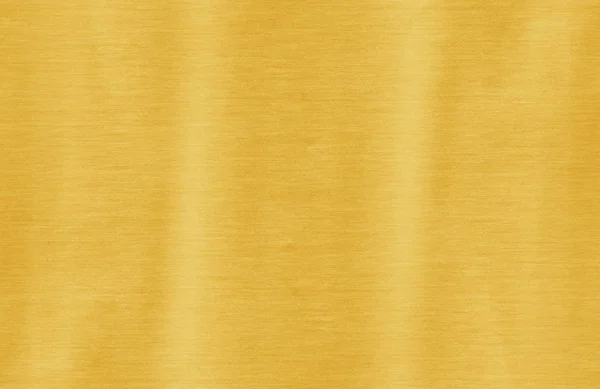 Textura zlaté fólie lesklé žluté listy — Stock fotografie