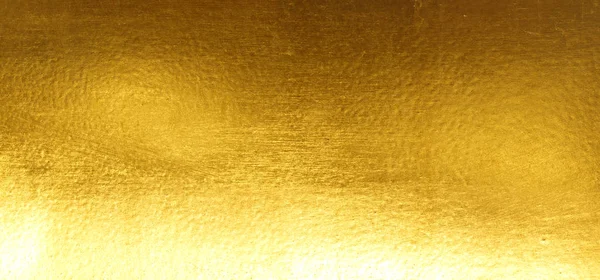 Shiny yellow leaf gold foil texture — Stock Photo, Image