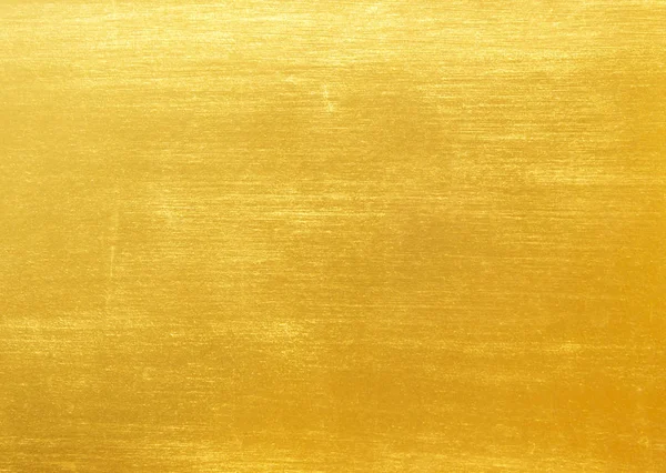 Brillante foglia giallo oro lamina texture — Foto Stock