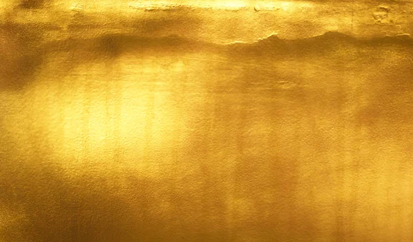 Glanzend geel blad goud folie textuur — Stockfoto