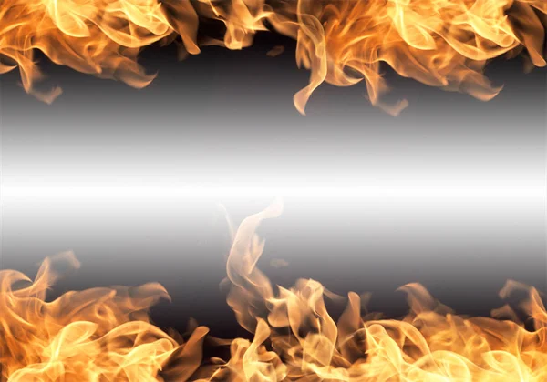 Brand flammer på en sort baggrund - Stock-foto