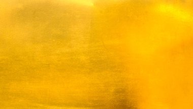 Altın metal fırçalanmış arka plan veya fırçalanmış çelik dokusu