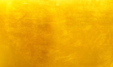 Altın metal fırçalanmış arka plan veya fırçalanmış çelik dokusu
